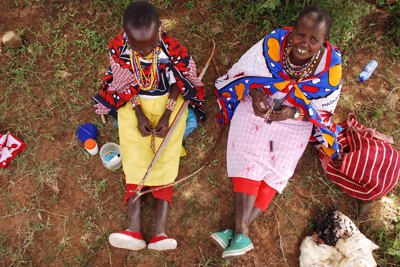 Maasai ladies making beaded works of art Kenya
