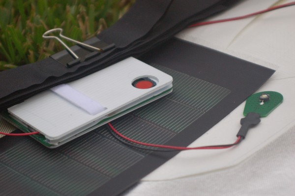 The control unit and an unassembled FLAP bag's flap The control unit and an unassembled FLAP bag's flap