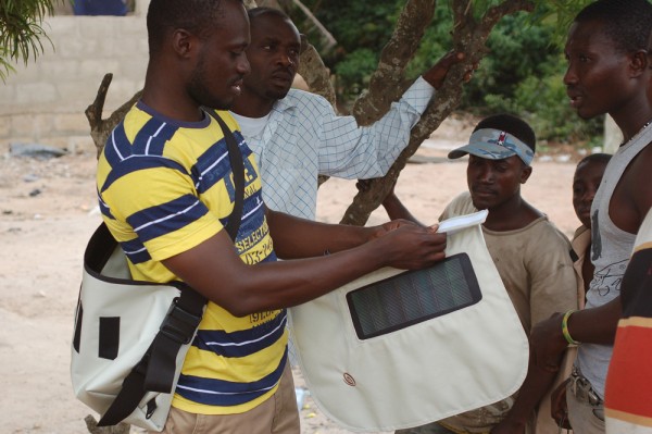 Henry Addo explaining the FLAP bag to mechanics in Accra Ghana